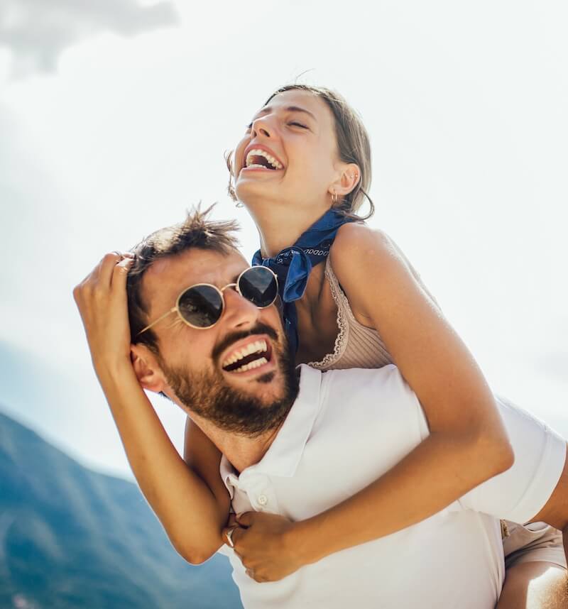 couple smiling at beach